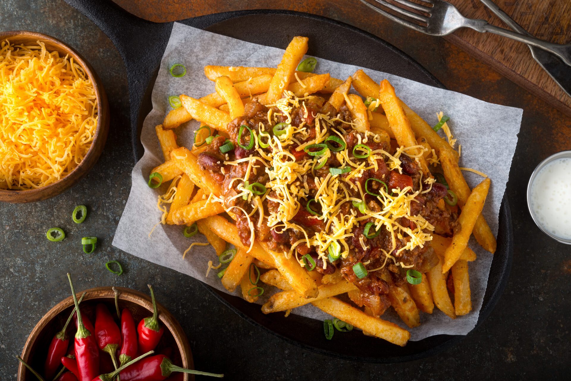 fries with cheese vegetables and meat